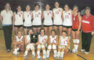 Marion Central Volleyball team with coach Deb Raker and the team's championship plaque